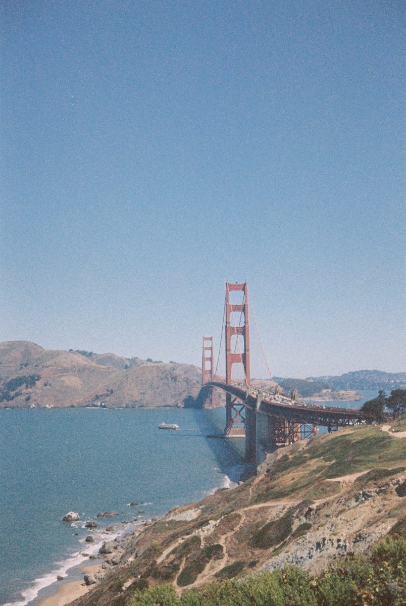 The Golden Gate Bridge spanning the bay in San Francisco under a clear sky